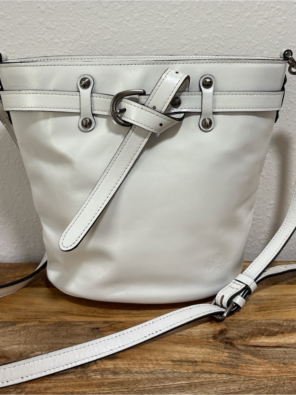 Patricia Nash white leather Eleanor belted bucket crossbody bag